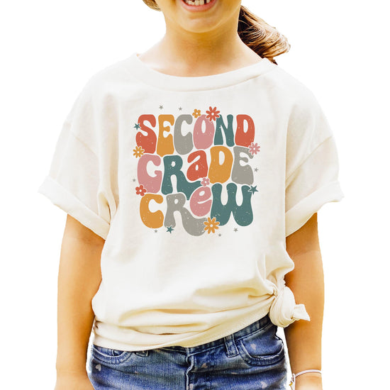 Toddler wearing retro second grade flower graphic tee for back to school