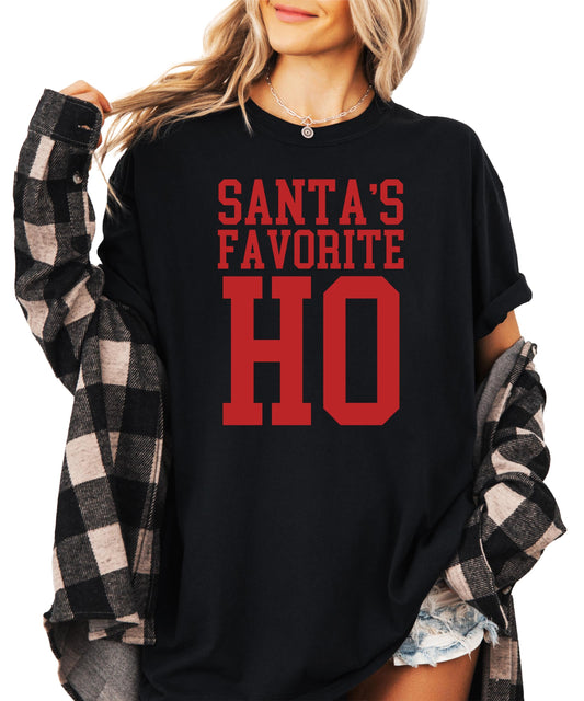 Women's oversized vintage red Santa's Favorite Ho funny Christmas graphic tee from Olive Loves Apple
