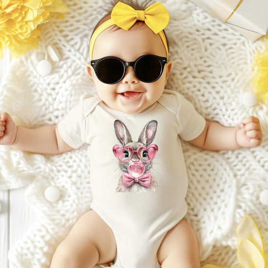 Close-up of bubblegum bunny graphic print on baby girl bodysuit showing vibrant color and detail