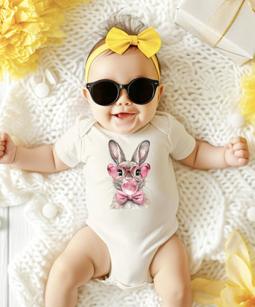 Close-up of bubblegum bunny graphic print on baby girl bodysuit showing vibrant color and detail