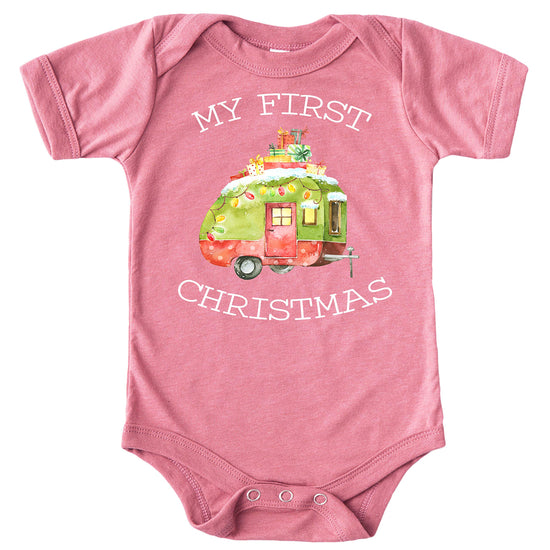 Close-up of My First Christmas camper themed baby bodysuit showing vibrant holiday print detail