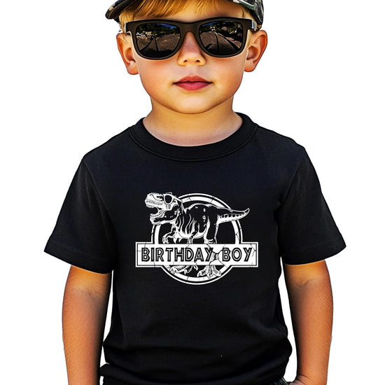 Close-up of Birthday Boy dinosaur shirt graphic showing detailed T-Rex design and text