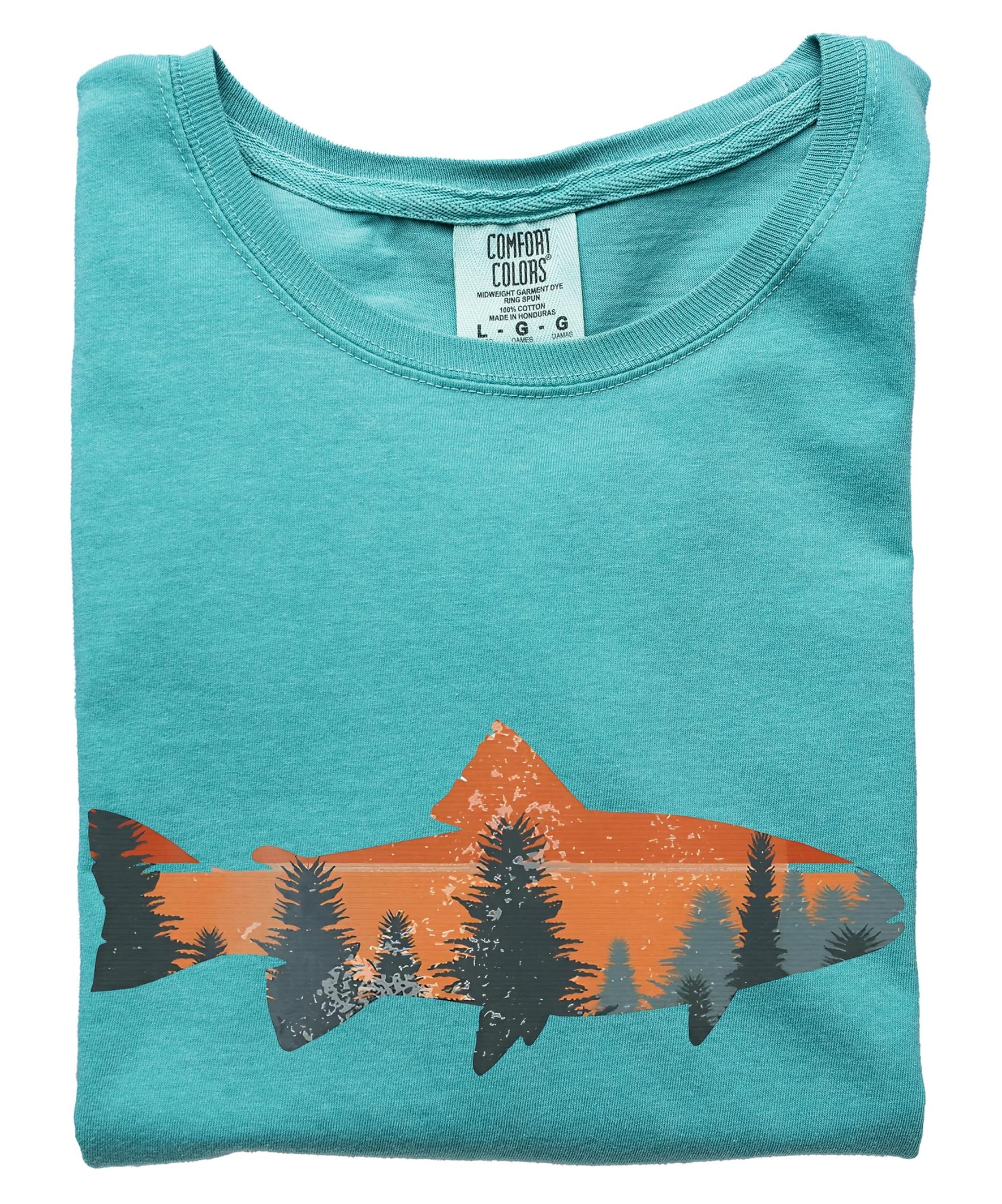 Close-up view of trout fishing sunset graphic print on seafoam colored shirt