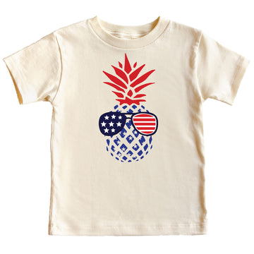 Pine tree and American flag sunglasses graphic on a natural color youth tee for 4th of July