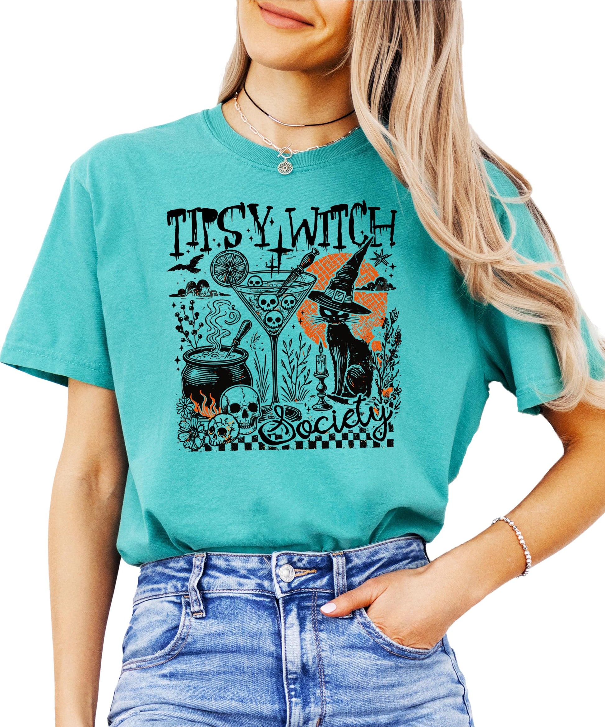 Tipsy Witch Society Halloween graphic tee featuring a witchy black cat, cocktail glass, and cauldron design on a black shirt