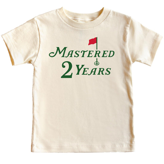 Back view of natural colored Mastered 2 Years golf birthday tee for kids