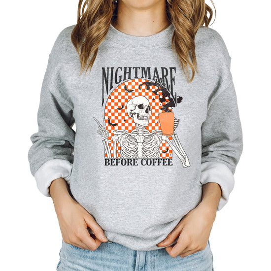 Nightmare Before Coffee gray sweatshirt with retro skeleton and bat graphic for women and teens