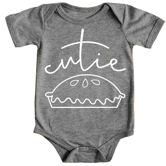 Baby wearing Cutie Pie vintage royal blue bodysuit, full outfit view