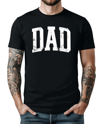 Close-up of bold distressed DAD block letter print on vintage red men's tee