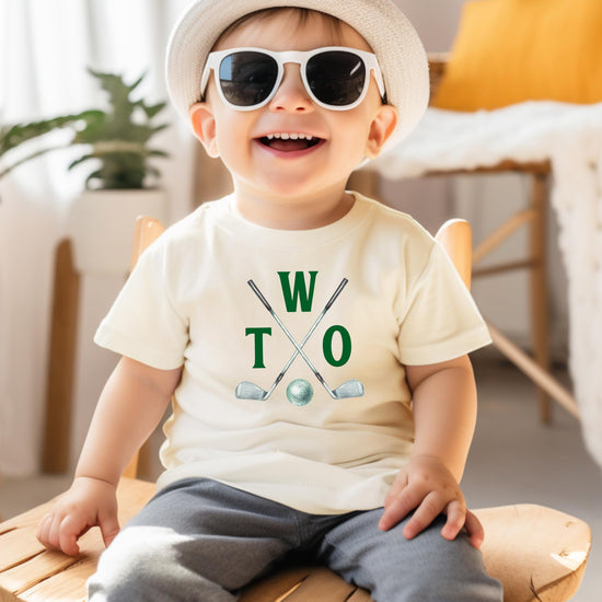 Close-up of Two Golf Sticks golf birthday shirt design on toddler tee