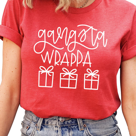 Lifestyle flat lay of Gangsta Wrappa funny sarcastic Christmas shirt in red