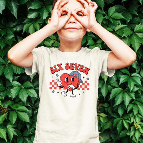 Flat lay of kids unisex Valentine's heart shirt showing full graphic print detail
