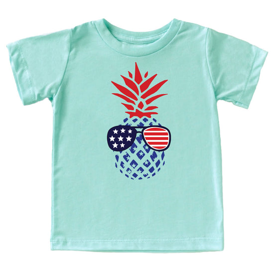 Close-up of pine American flag sunglasses graphic print on natural color cotton tee