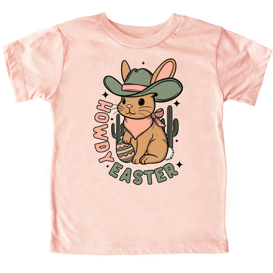 Front view of youth Howdy Easter western graphic shirt in peach with desert bunny cowboy design