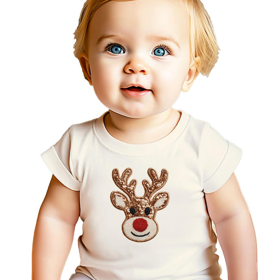 Detail shot of festive reindeer ink-print design on black Christmas shirt for girls