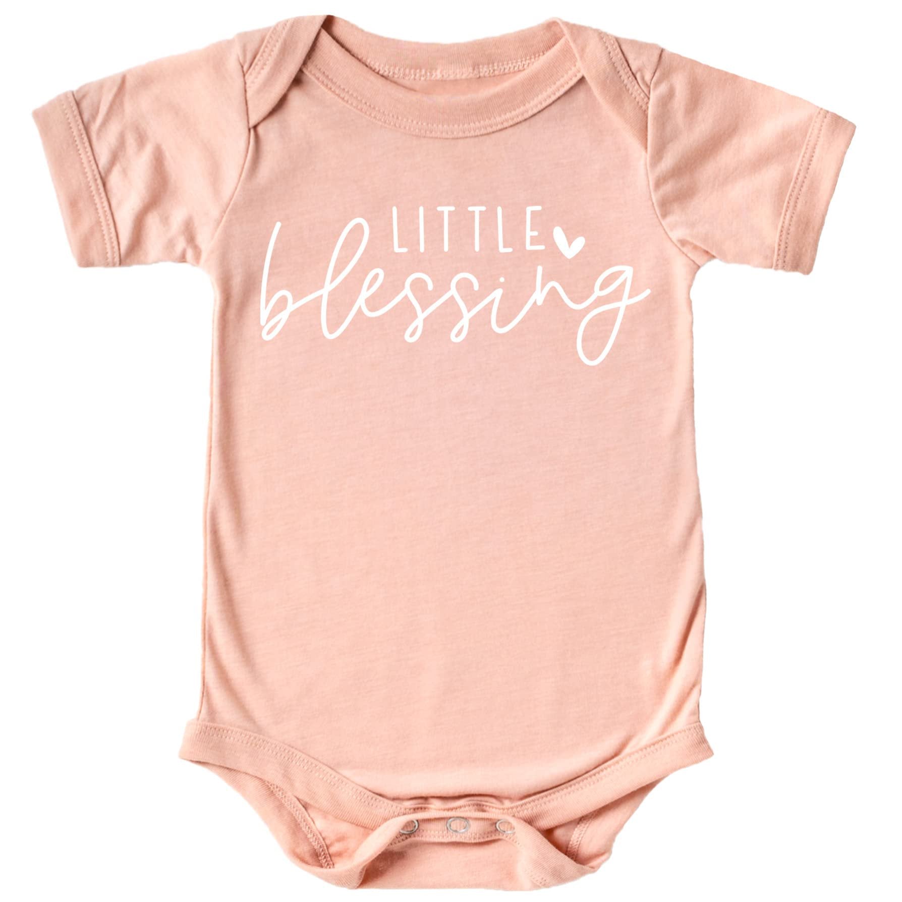 Little Blessing Heart baby girl bodysuit on model, perfect for newborn photos or take-home outfit