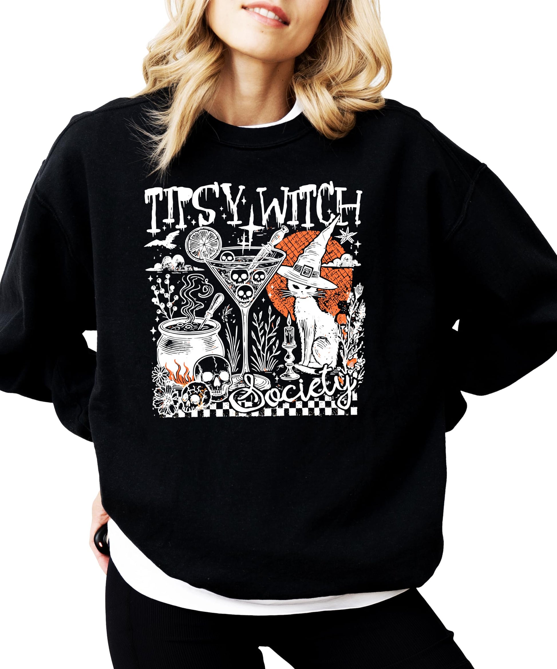 Flat lay of black women's Halloween crewneck sweatshirt with Tipsy Witch Society funny graphic tee design