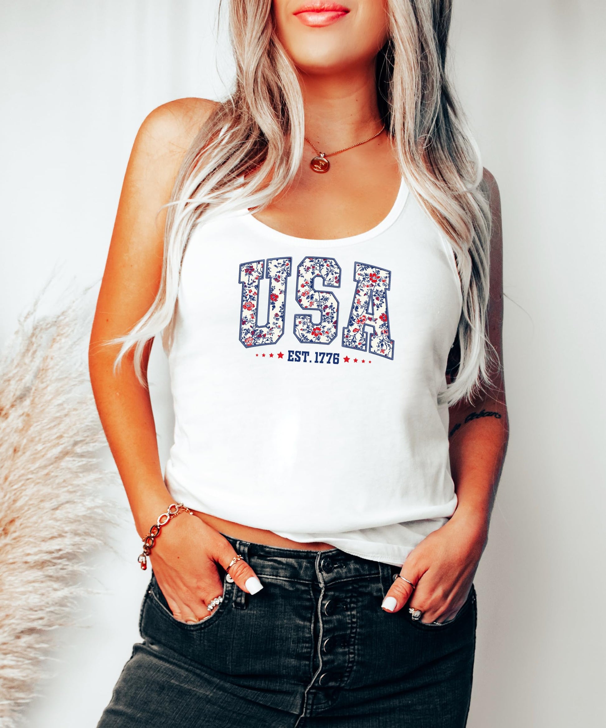 Back view of USA Est 1776 patriotic tank top displaying full floral design pattern