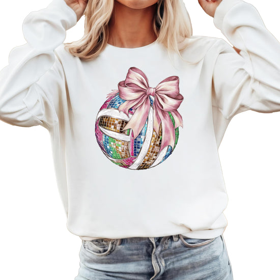 Women's gray volleyball sweatshirt with girly pink bow and disco ball graphic, lifestyle view