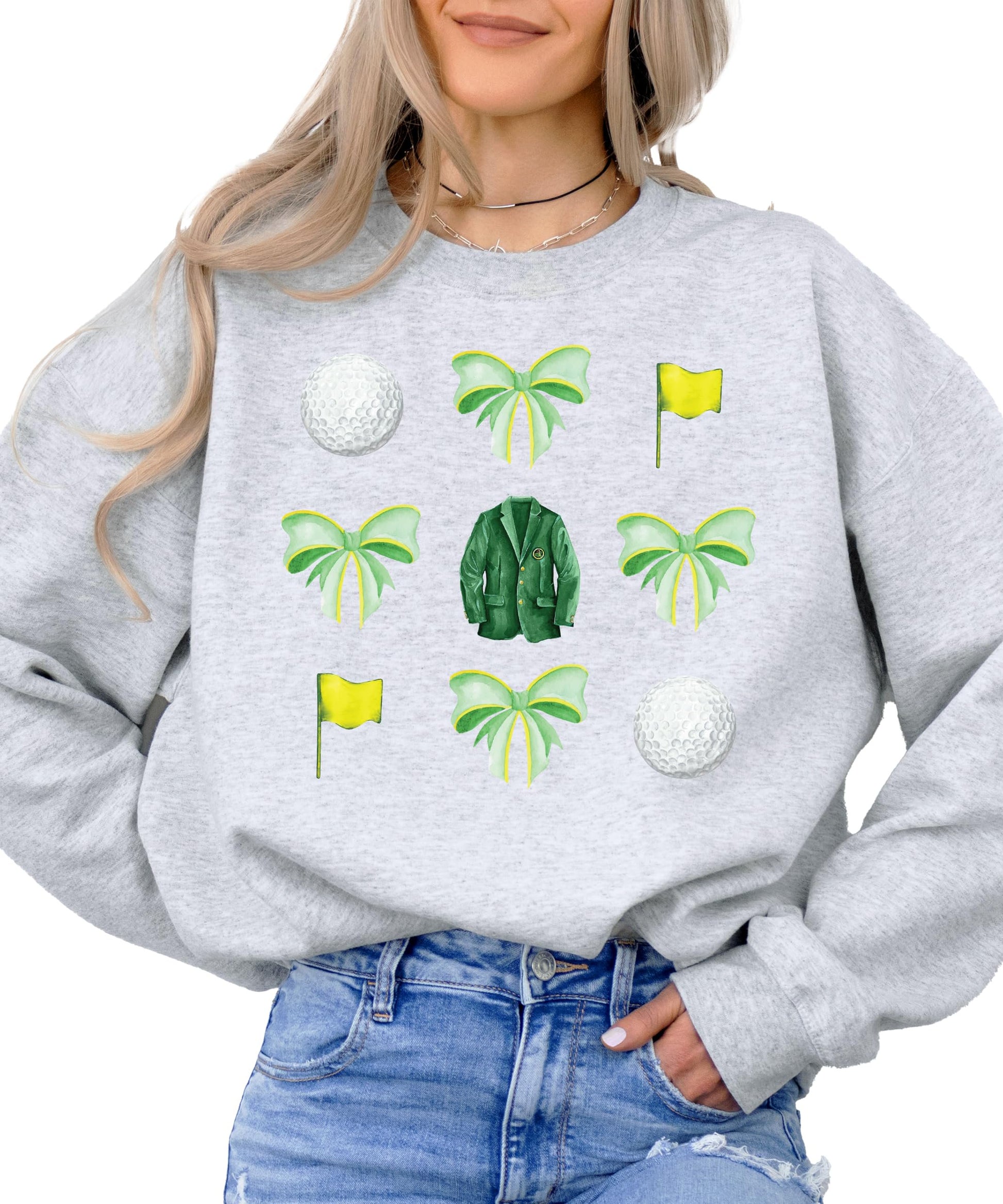 Front view of golf tournament sweatshirt with colorful bows and golf ball print on white