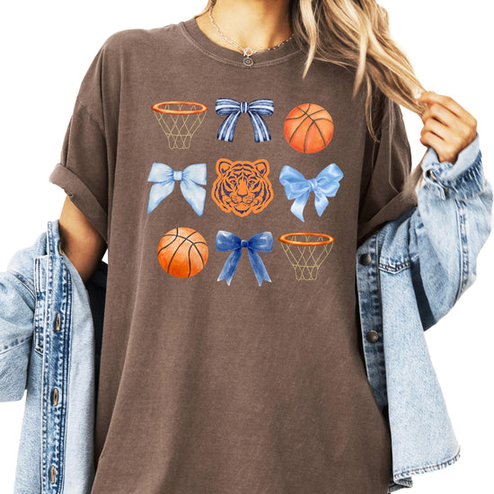 Women's ivory Tigers mascot graphic tee with basketball and blue bow design, front view