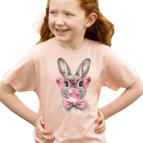 Olive Loves Apple Easter bunny tee for girls laid flat showing full graphic design