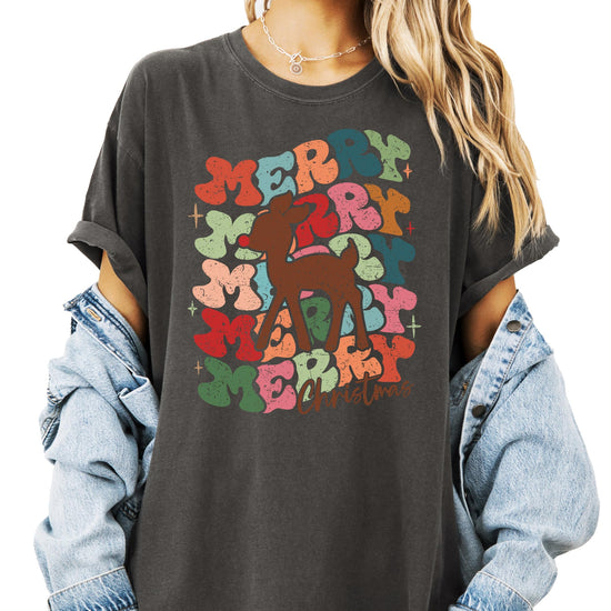 Close-up of vintage-inspired Merry Christmas reindeer print on women's holiday graphic tee