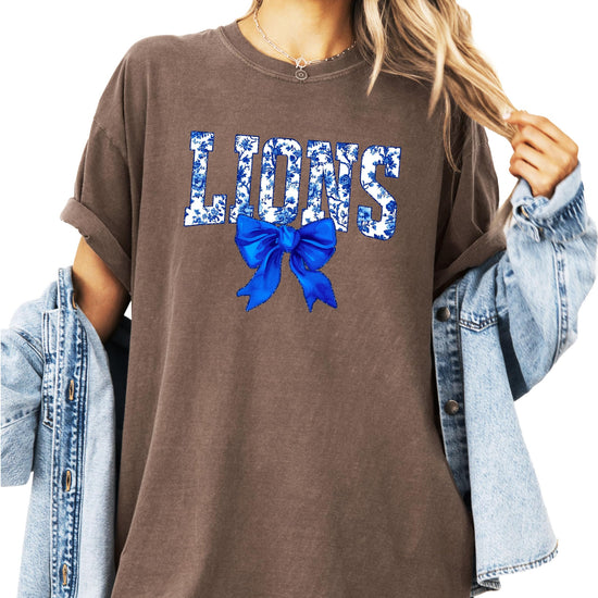 Ivory Lions floral t-shirt with blue bow design for women
