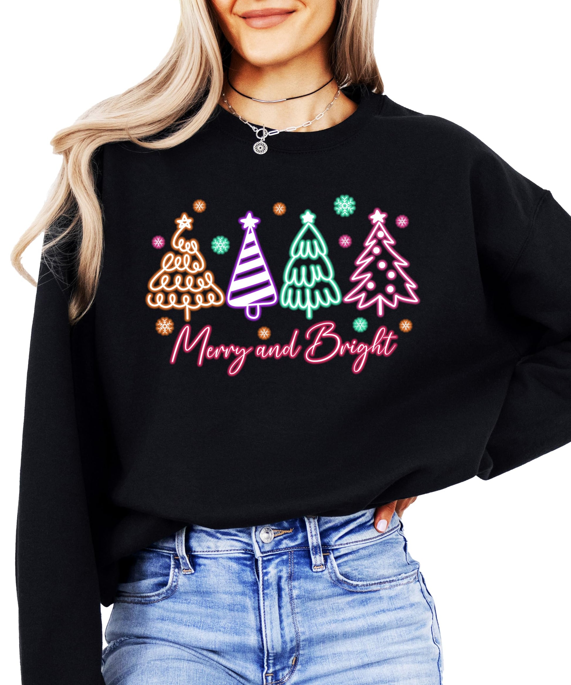 Women's black pullover sweatshirt with electric neon Christmas trees and Merry and Bright graphic print