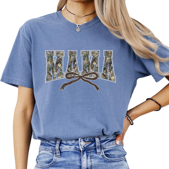 Flat lay of seafoam Mama camo graphic tee showing full front print with varsity lettering and bow