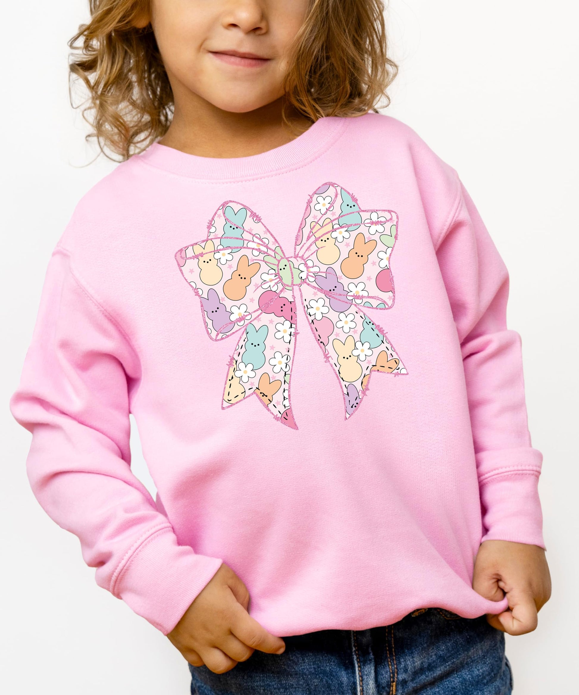 Side view of soft pastel pullover sweatshirt with Easter holiday graphic for girls