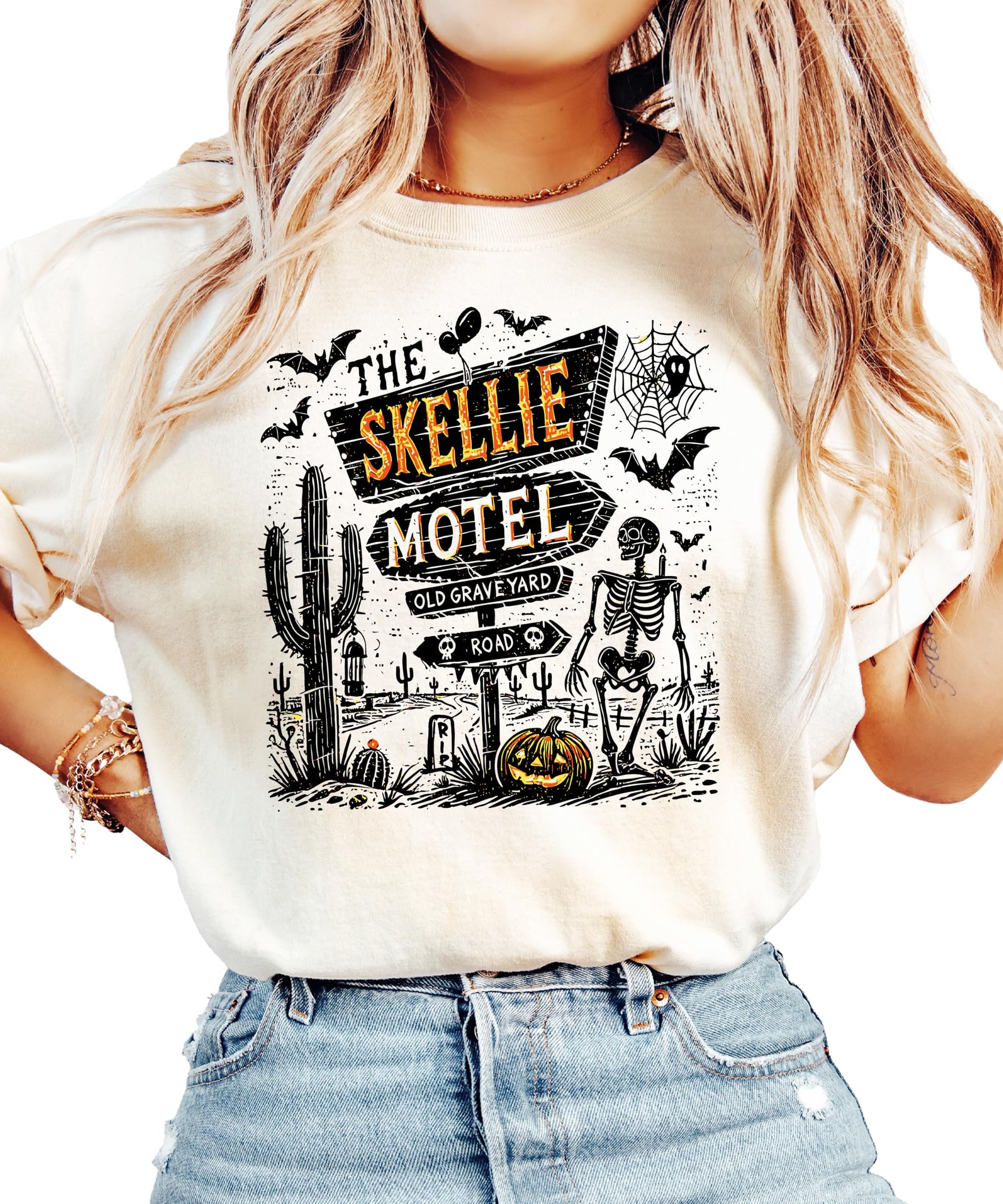 Model wearing Skellie Motel unisex Halloween graphic tee in seafoam, relaxed casual fit