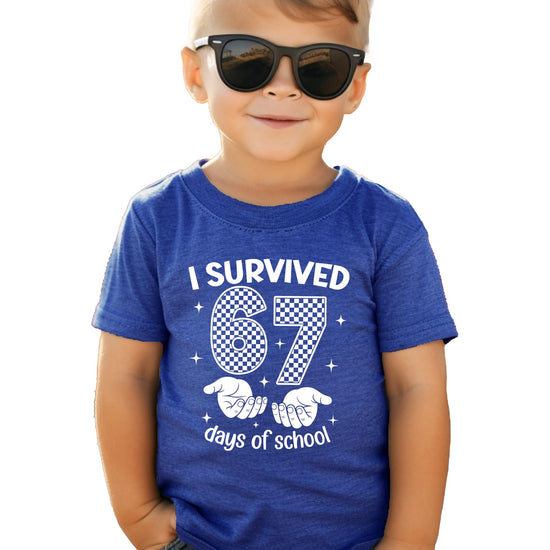 Front view of I Survived 67 Days of School kids shirt with six seven checker hands graphic