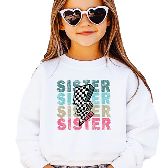 Front view of toddler girl sweatshirt featuring vibrant SISTER text repeated in multiple colors