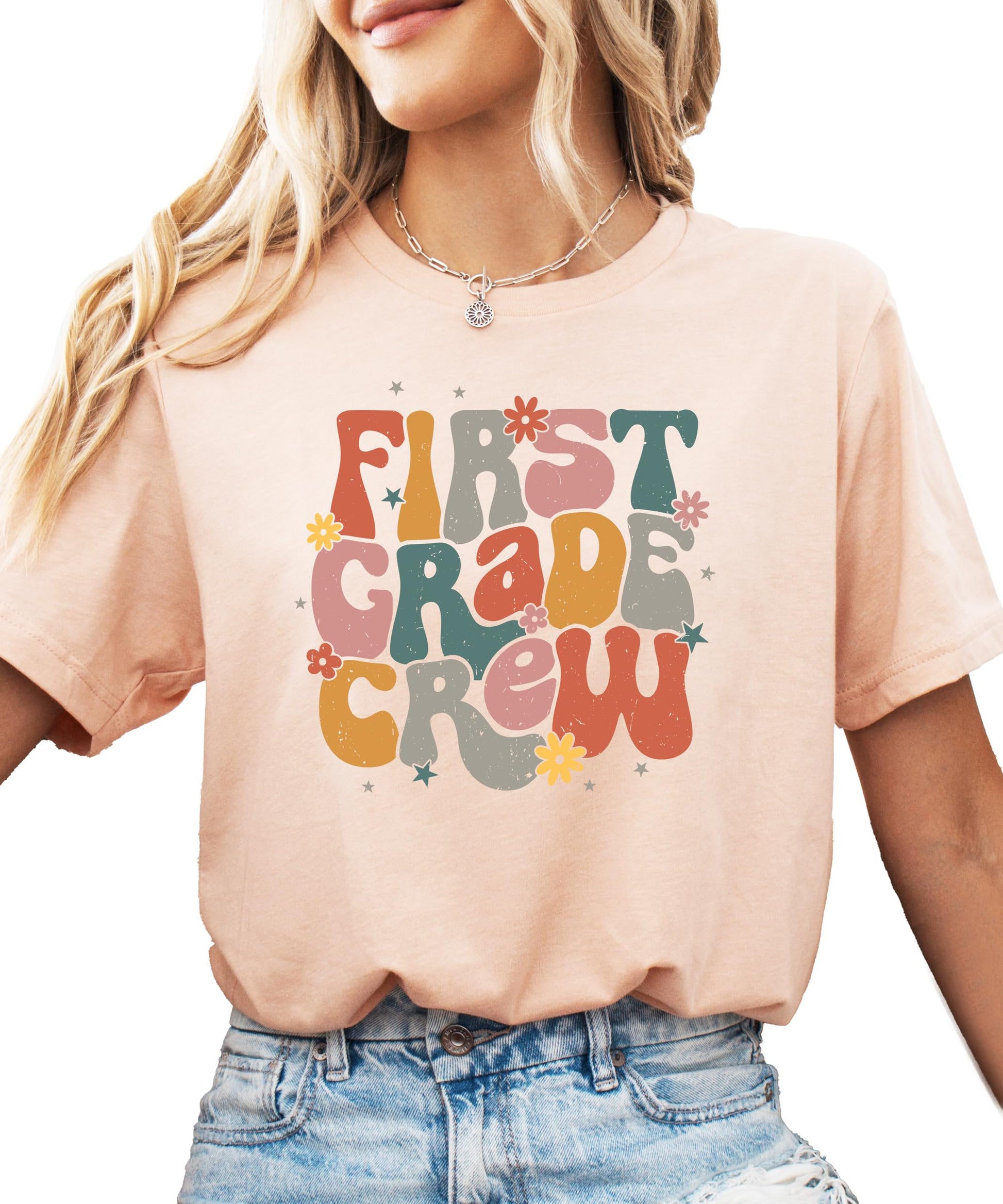 Back view of black First Grade Crew kids' t-shirt by Olive Loves Apple