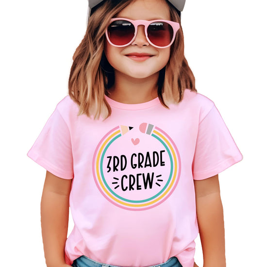 Kids mauve crew neck tee with colorful pencil graphic that reads 3rd Grade Crew back to school design