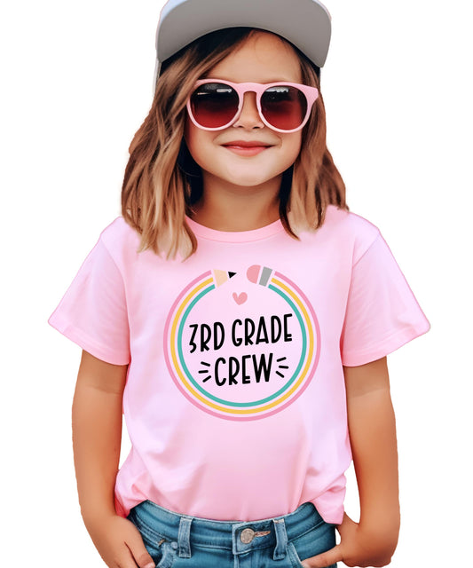 Kids mauve crew neck tee with colorful pencil graphic that reads 3rd Grade Crew back to school design