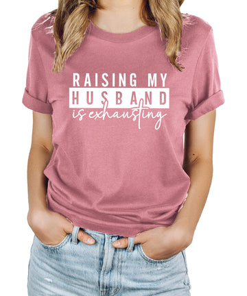 Heather blue women's graphic tee with 'Raising My Husband Is Exhausting' funny wife design