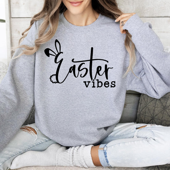 Front view of Easter Vibes sweatshirt for women featuring a cute Easter bunny graphic