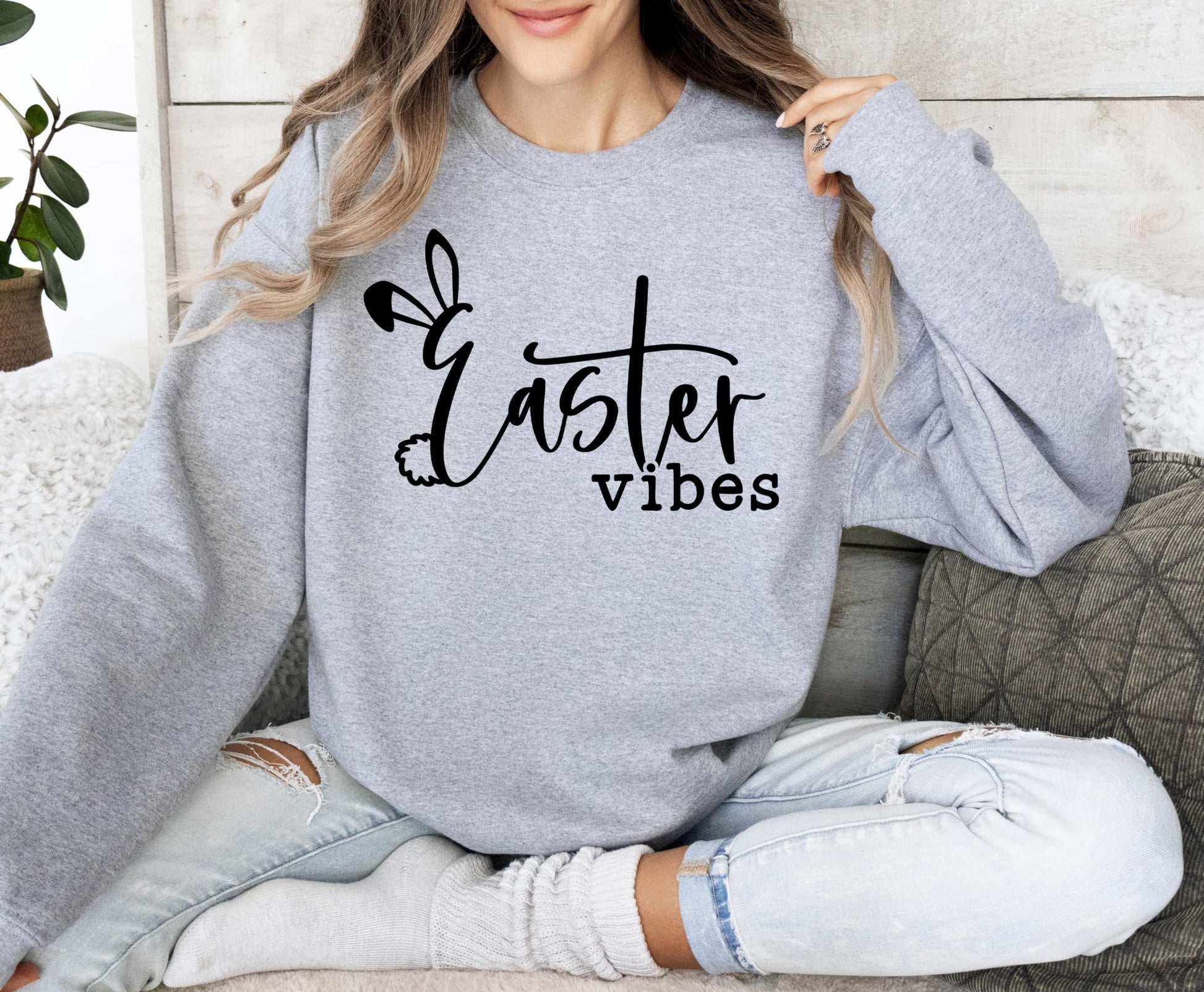 Front view of Easter Vibes sweatshirt for women featuring a cute Easter bunny graphic