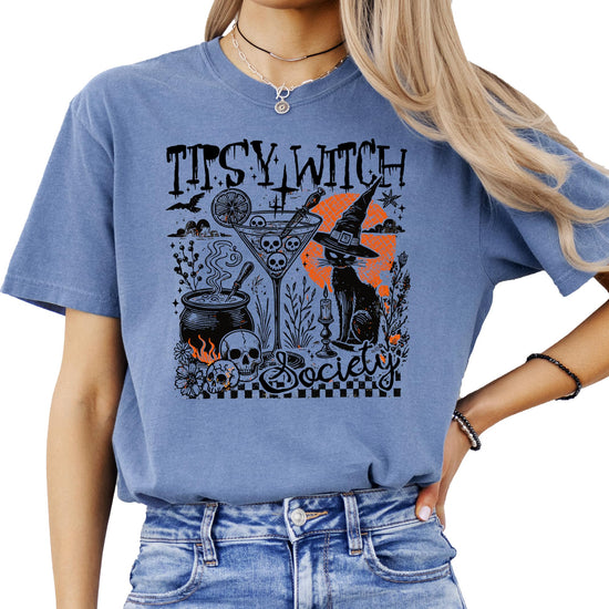 Front view of Tipsy Witch Society black Halloween graphic t-shirt with witchy cat and cocktail illustration