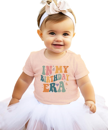 Kids 'In My Birthday Era' peach graphic tee with trendy wavy lettering design for girls