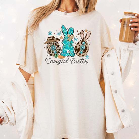 Detail shot of cowgirl Easter bunnies shirt showing print quality and fabric texture on dark brown tee