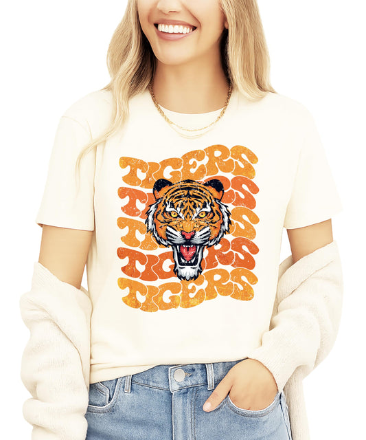 Retro orange tigers mascot shirt with distressed lettering and tiger face graphic on natural colored tee