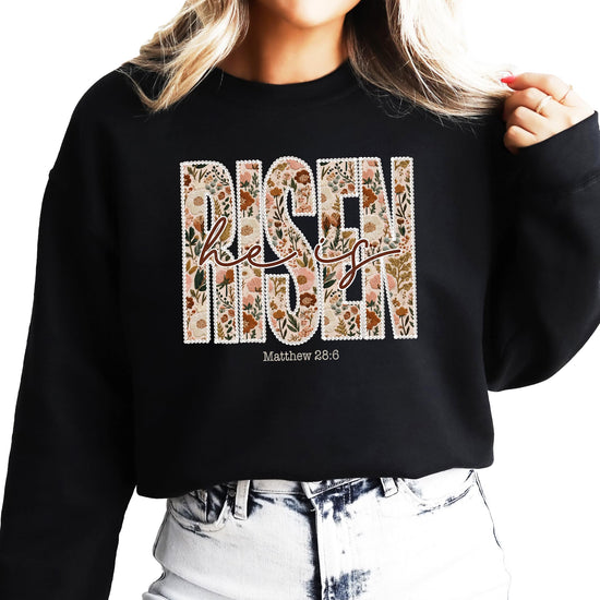 Front view of floral He Is Risen Christian pullover sweatshirt for women in army green