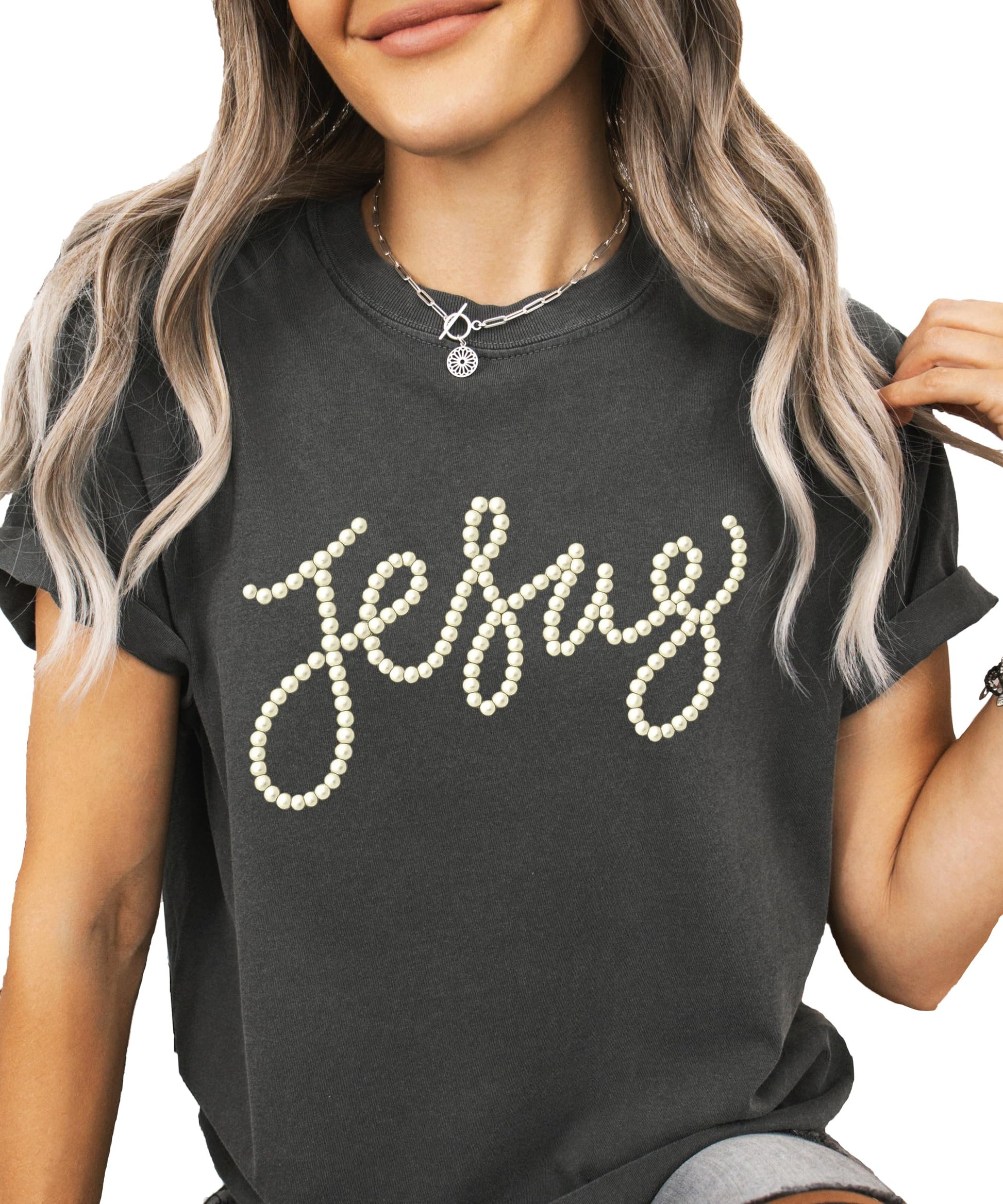 Flat lay or folded view of seafoam pearl script Jesus women's graphic tee