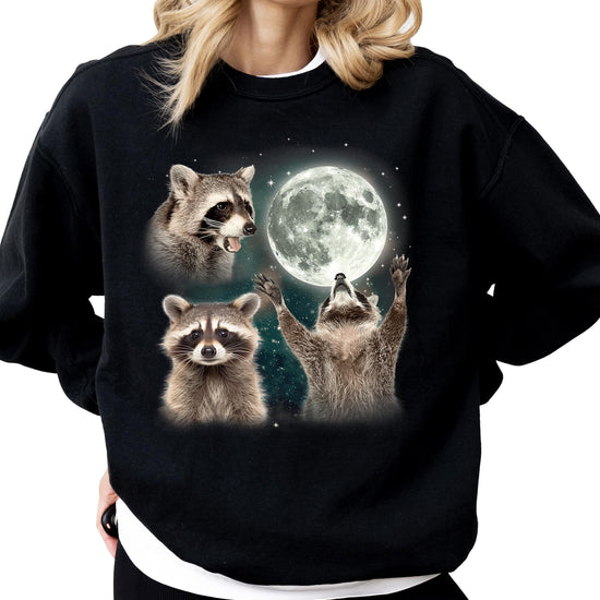 Model wearing funny raccoon graphic sweatshirt in gray, casual relaxed fit