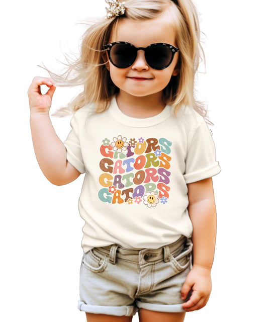 Gators groovy retro graphic tee with smiley flowers and colorful lettering on a natural shirt