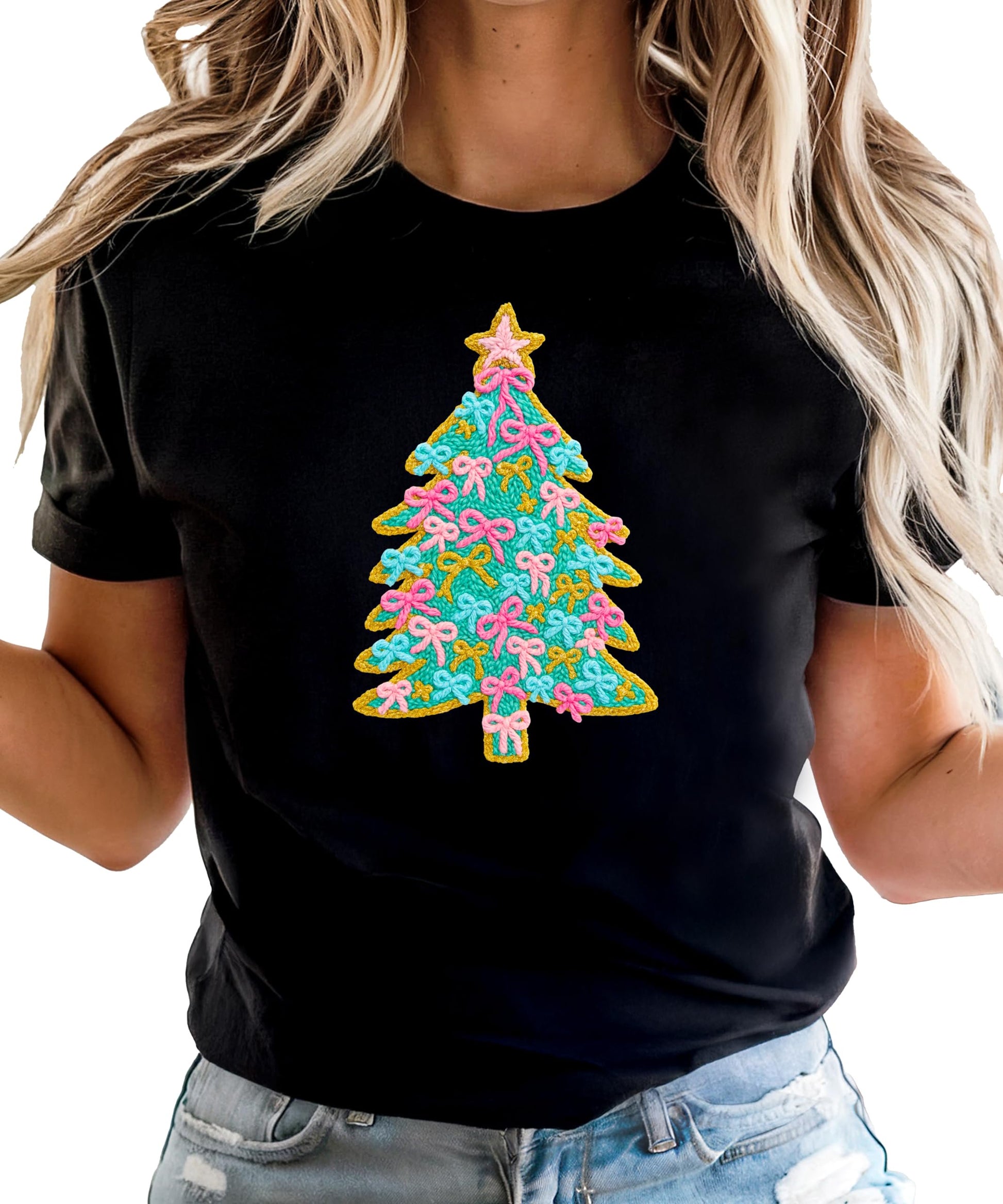 Side angle view of kids holiday graphic shirt with Christmas tree, pink bows, and gold star topper