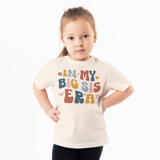 'In My Big Sister Era' youth tee displayed showing full front graphic design for big sister announcement